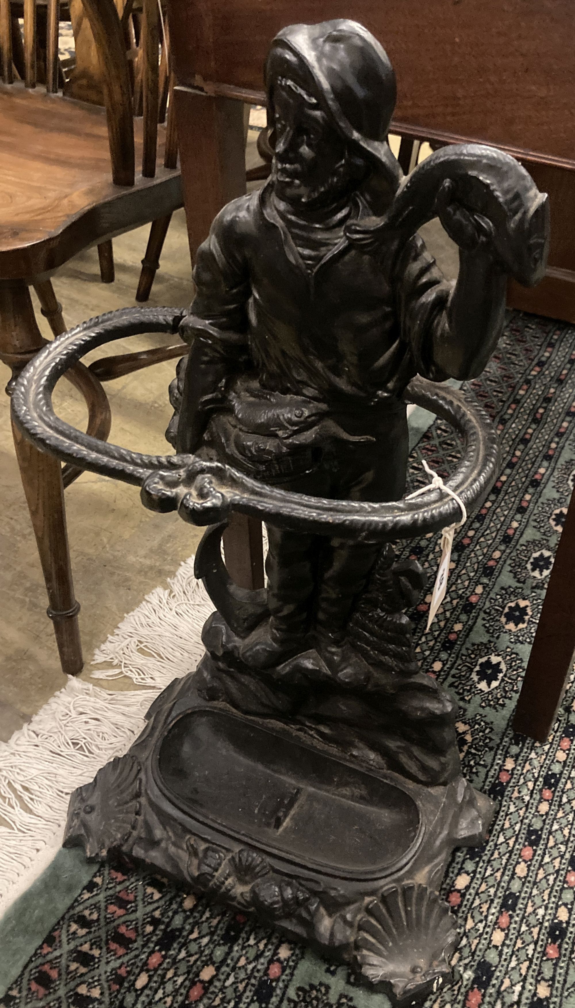 A Victorian style painted cast iron stick stand, height 67cm